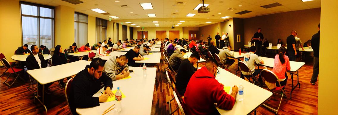 Participants sitting at tables